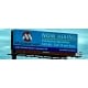A light blue billboard for Microchip that reads 'Now Hiring, Production Specialists, $19.68 - $22.12 per hour'